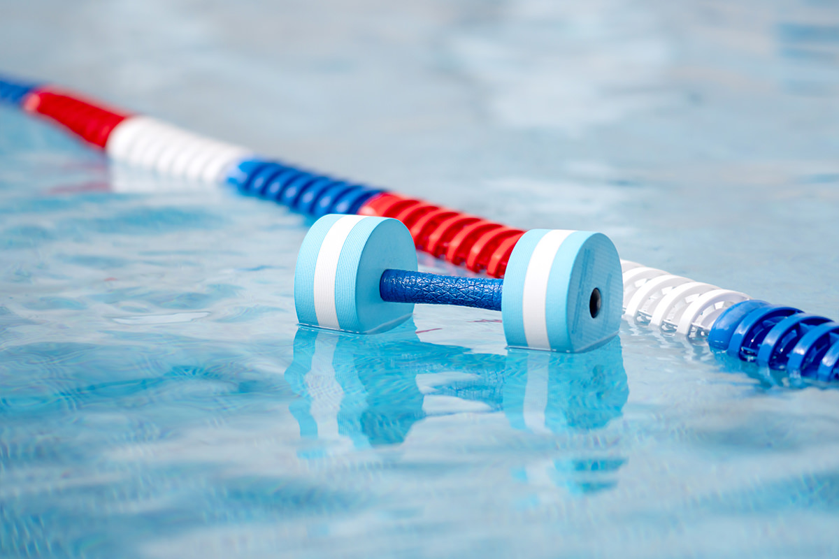 View of plastic dumbbells for aquafitness. Sports equipment for aqua aerobics